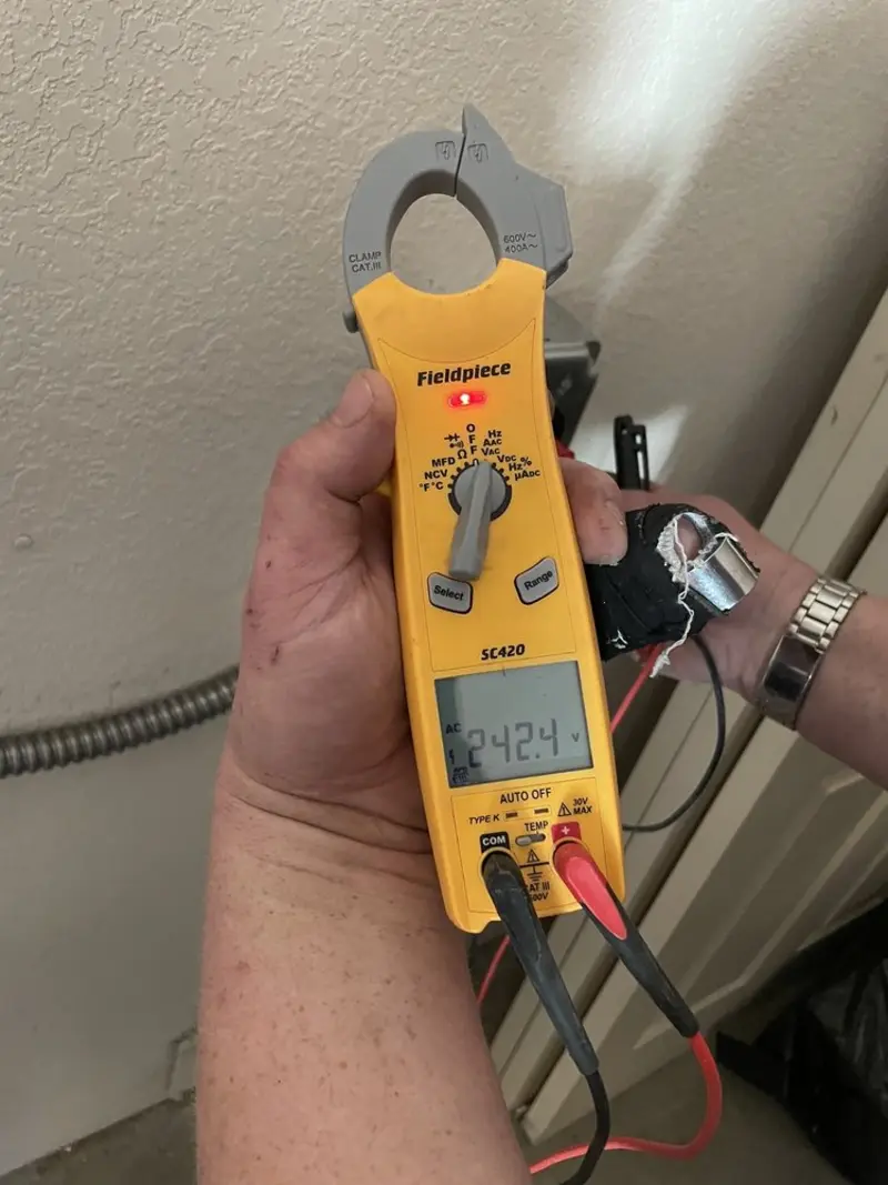 Voltage testing with clamp meter during Circuit Breaker Repair in Moonachie